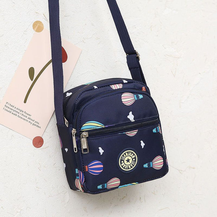 Wholesale Classic floral fabric shoulder bag, small square bag, Oxford fabric phone bag, diagonal cross bag, night market women's bag