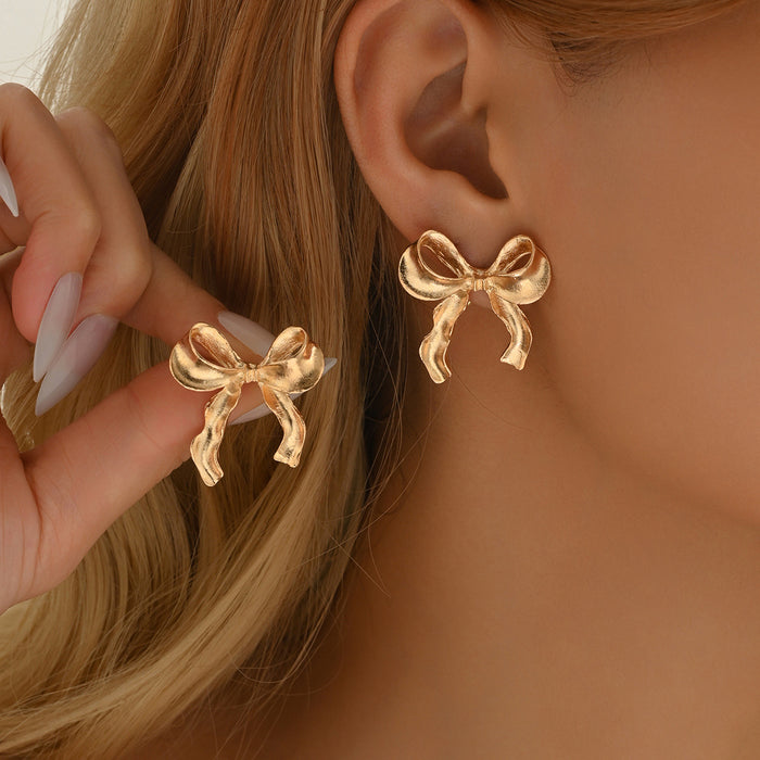 Wholesale Bow metal earrings for daily commuting, versatile earrings, simple and fashionable, smooth and elegant earrings