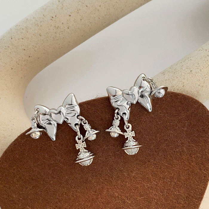 Wholesale Fashionable design earrings, personalized bow, metal, exaggerated personality