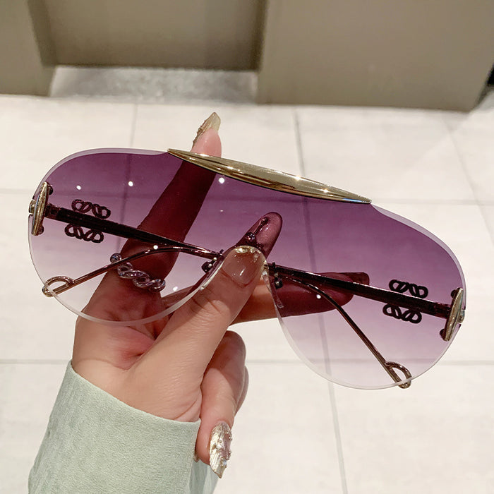 Wholesale Frameless sunglasses, personalized one-piece large frame, fashionable and high-end sunglasses