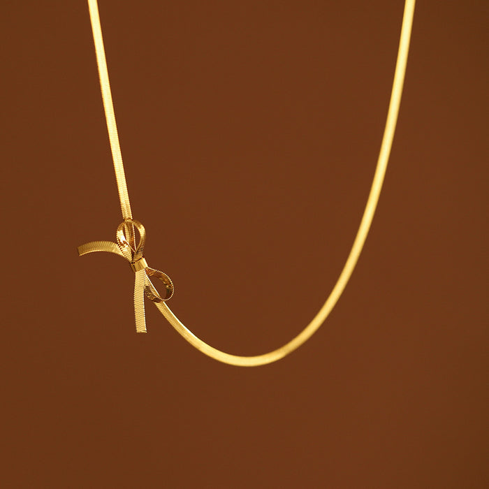 Wholesale Titanium Steel 18K Gold Plated Snake Bone Chain Bowknot Necklace JDC-NE-YiBao001