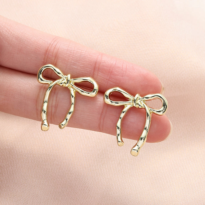 Wholesale Butterfly knot earrings, simple and fashionable, smooth and elegant earrings