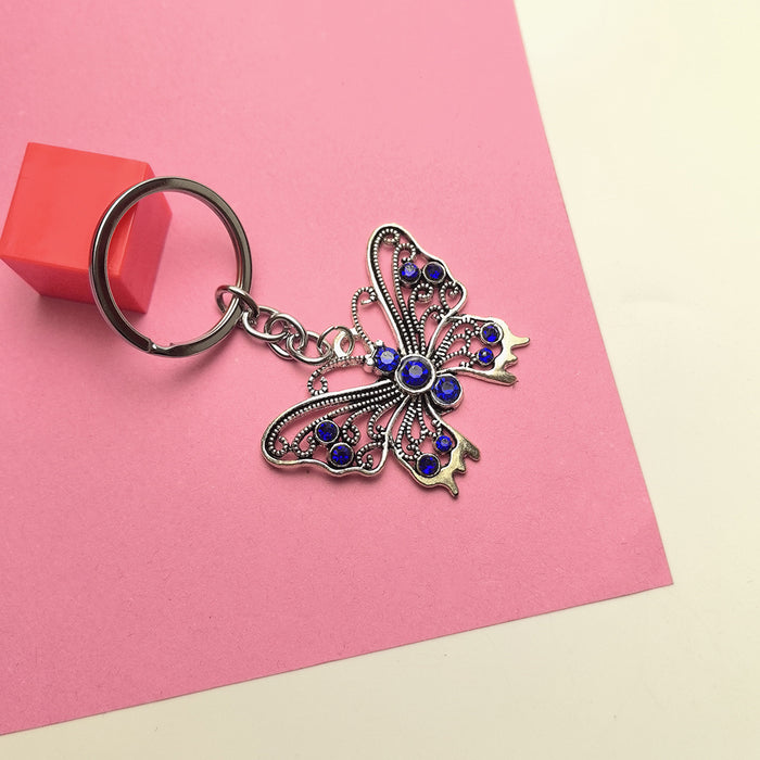 Wholesale Blue Eye Pendant Flower Butterfly Keychain Pendant Bag