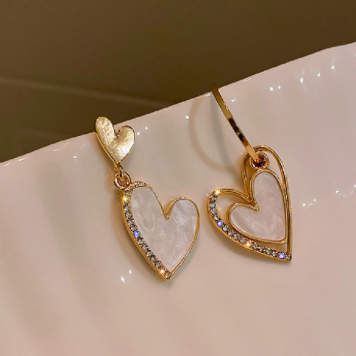 Wholesale Silver needle studded diamond asymmetrical heart-shaped earrings, light luxury and versatile earrings