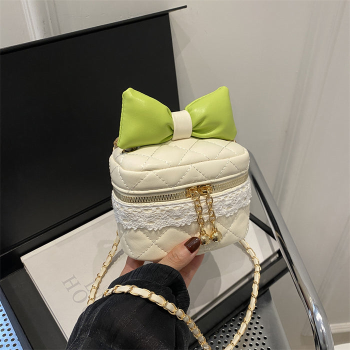 Wholesale Children's bag bow bucket bag cute contrasting color girl chain crossbody bag