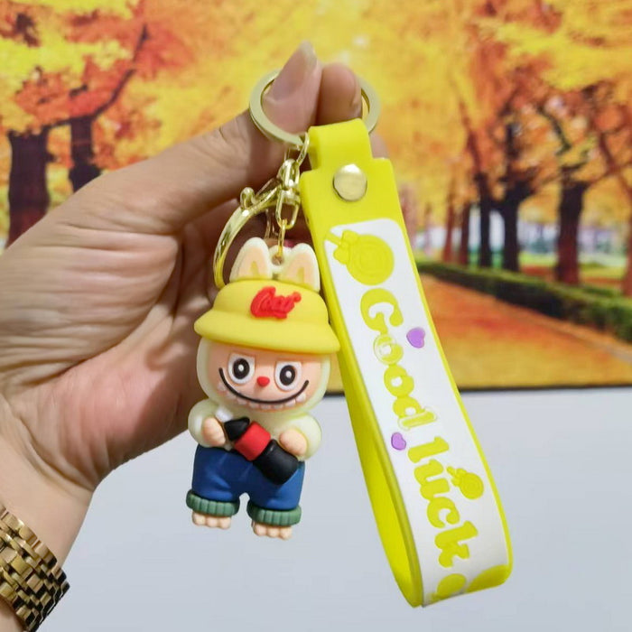 Wholesale Cute cartoon trendy schoolbag pendant keychain furry cute little monster