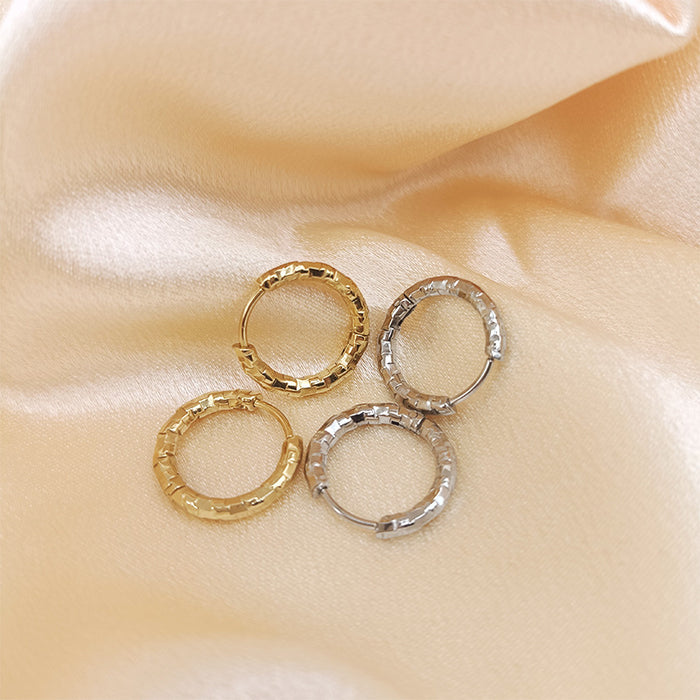 Wholesale Titanium steel earrings, gold-plated earrings, trendy and fashionable earrings, embossed circle earrings