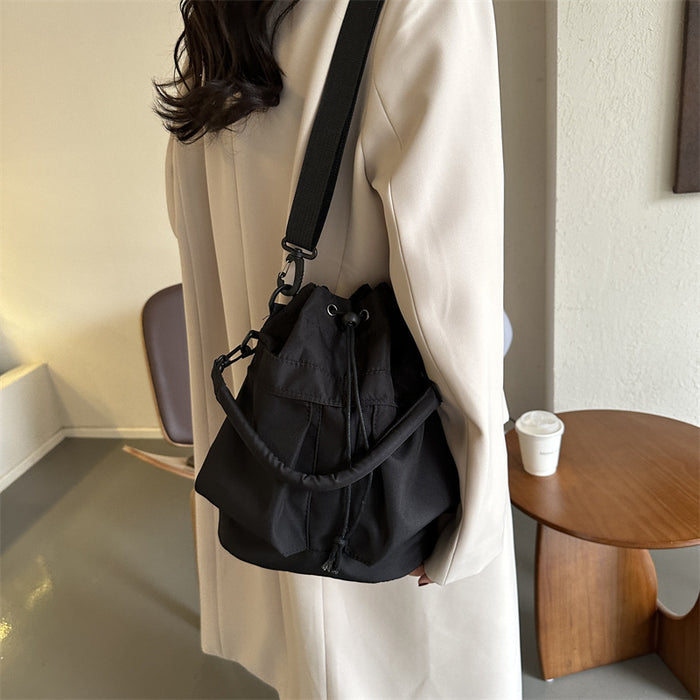 Wholesale Versatile new fashionable and casual bag with large capacity, hand-held drawstring, single shoulder, crossbody, water bucket bag