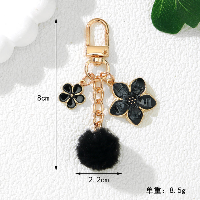 Wholesale Cute Cherry Blossom Flower Alloy Keychain Pendant Purple Decorative Accent for Resale