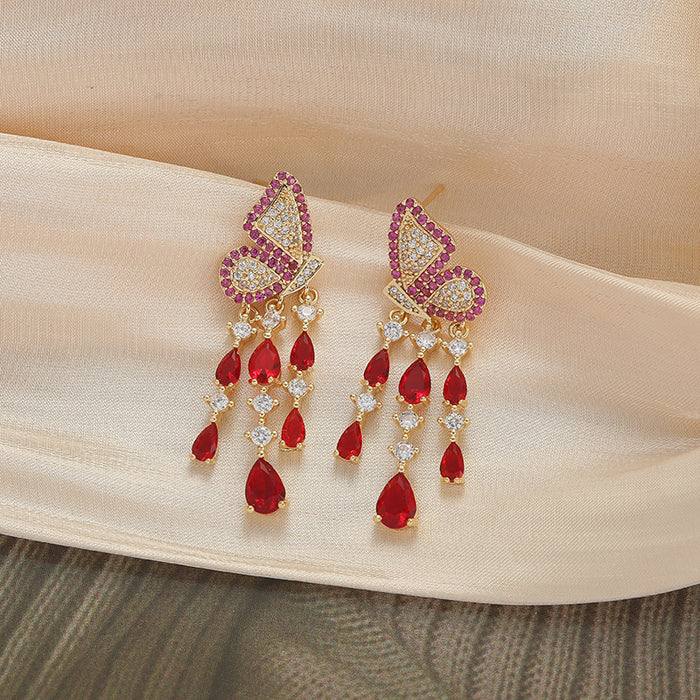 Wholesale Feather tassel earrings, retro fashion earrings, niche high-end, exaggerated earrings