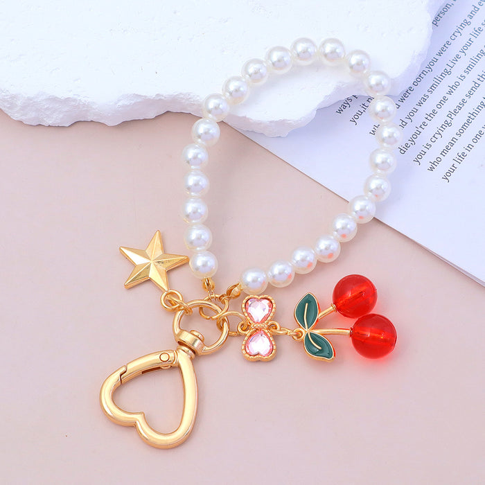 Wholesale Advanced Water Diamond Bow Cherry Keychain Pearl Chain Bag Pendant Car Hanging Accessories Versatile Accessories
