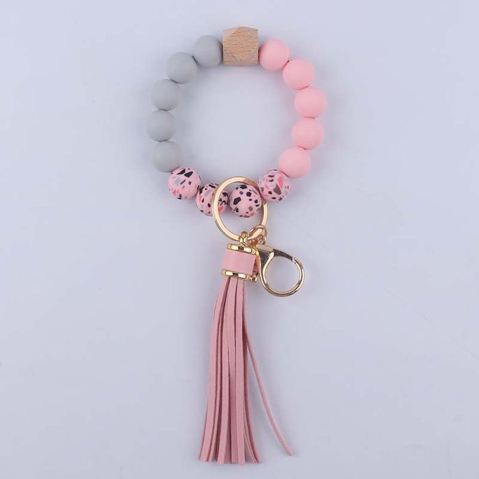 Wholesale Silicone leopard beads wrist keychain pendant leather PU tassel beaded bracelet accessories
