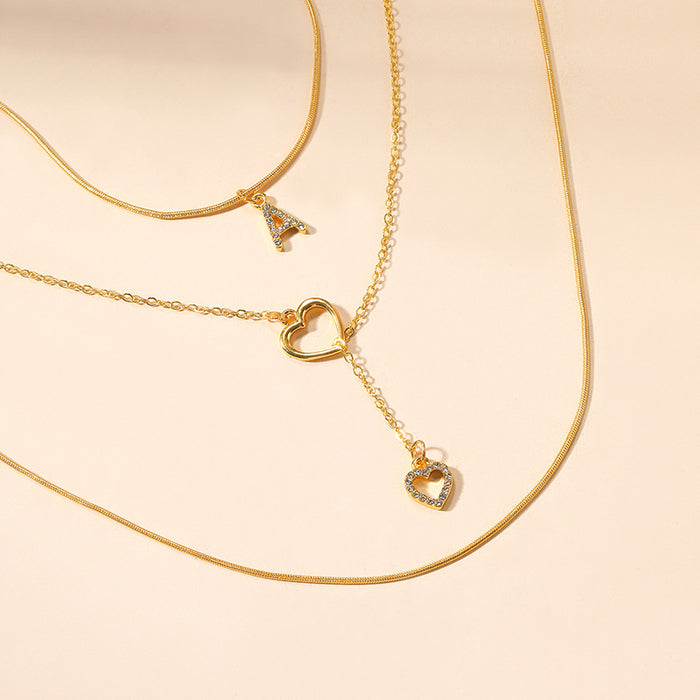 Wholesale Versatile jewelry, letter necklace, alloy heart tassel, three-layer necklace