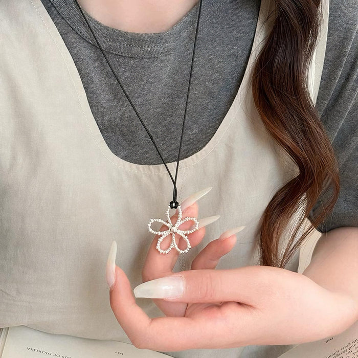 Wholesale Hollow flower necklace, simple black rope, adjustable neckchain, long and versatile collarbone chain