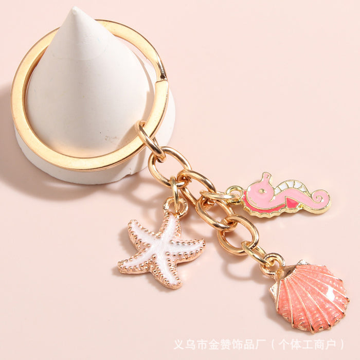 Wholesale Ocean shell keychain alloy oil drop pearl starfish pendant girls bag car ornaments small gift