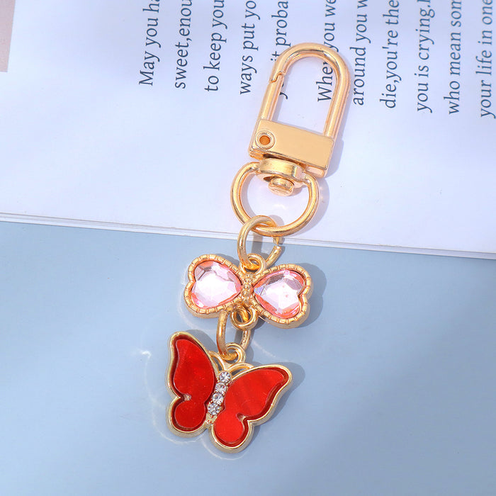 Wholesale Keychain Pendant Creative Alloy Butterfly Headphone Mobile Phone Bag Pendant