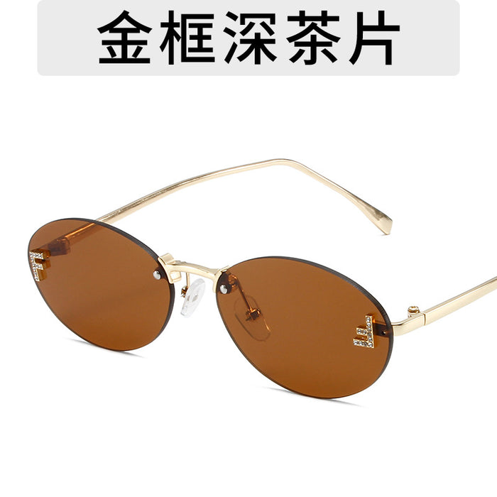 Wholesale Elliptical frame small frame sunglasses, new frameless cut edge personalized glasses, dot diamond sunglasses