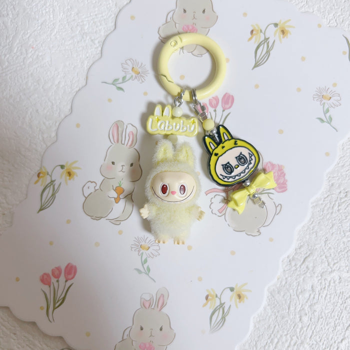 Wholesale Doll Enamel Sitting Posture Cute Mobile Phone Pendant Keychain