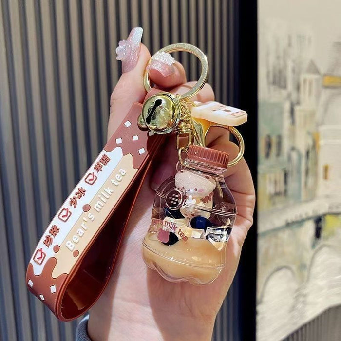 Wholesale bubble tea keychain floating small milk bear liquid quicksand bottle pendant couple gift bag hanging ornaments for women