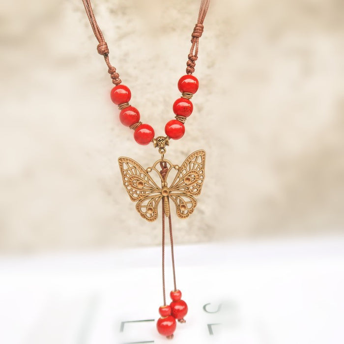 Wholesale Long sweater chain women's pendant retro butterfly necklace