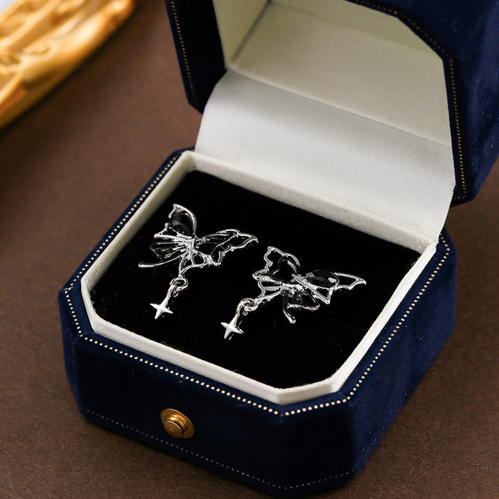 Wholesale Asymmetric butterfly hollow silver needle earrings, new personalized and niche earrings, high-end and versatile earrings