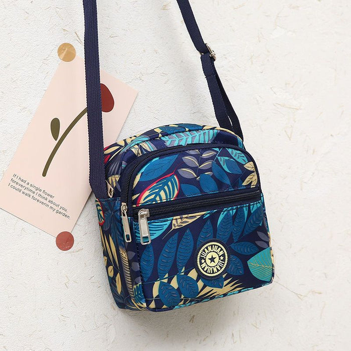 Wholesale Classic floral fabric shoulder bag, small square bag, Oxford fabric phone bag, diagonal cross bag, night market women's bag