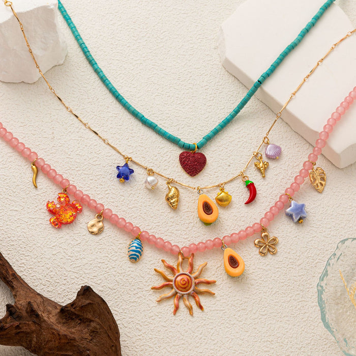 Wholesale Gold Plated Copper Human Face Sun Pendant Necklace With Heart Charm Boutique Resale