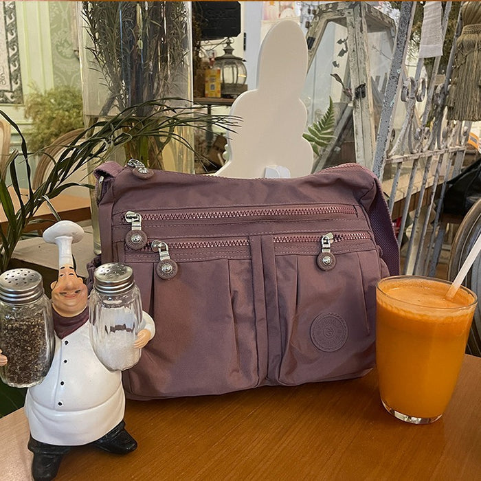 Wholesale Nylon fabric bag women' s urban simple messenger bag lightweight shoulder casual women' s bag