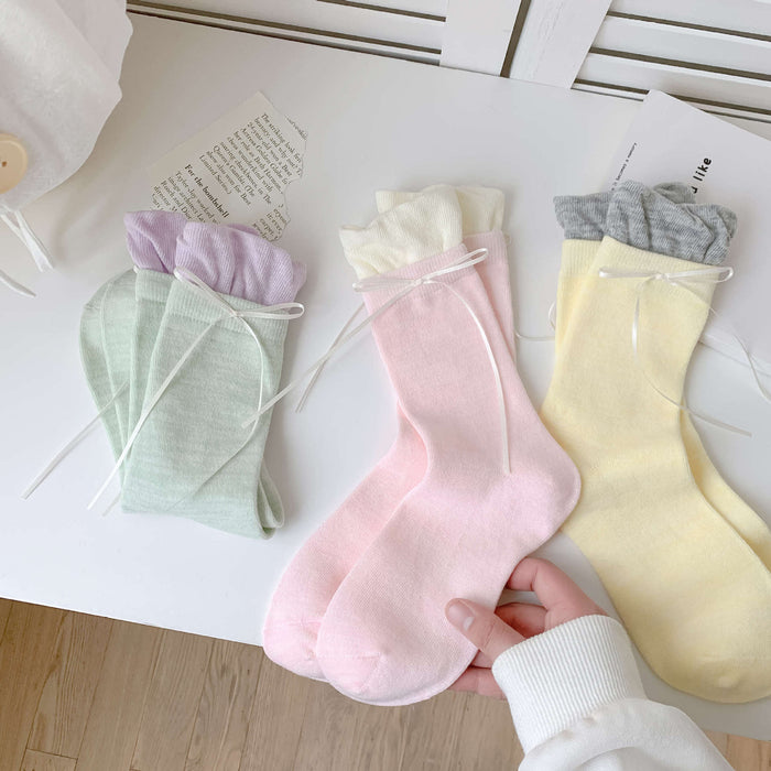 Wholesale Butterfly knot pile socks, cute and versatile pile socks