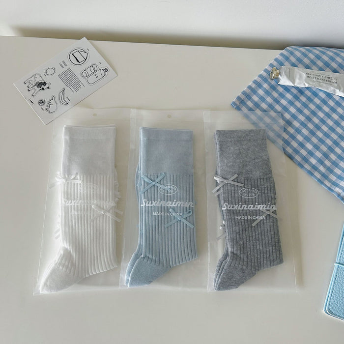 Wholesale Bow tie socks, long tube pile socks
