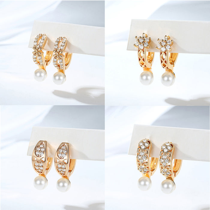 Wholesale Copper gold-plated retro light luxury simple pearl earrings, small and fashionable design, inlaid with zircon ear buckles, wholesale of ear accessories