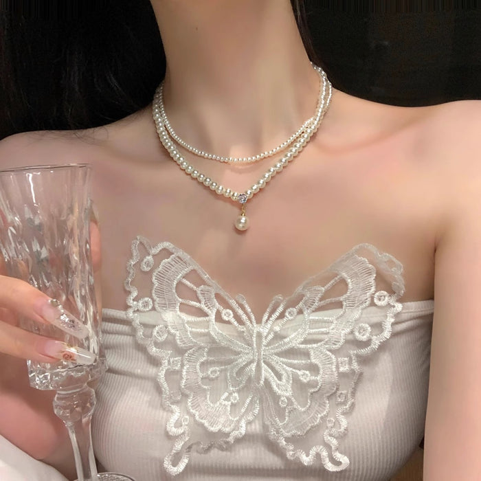 Wholesale Retro pearl double layered necklace with high-end feel, light luxury, niche collarbone chain