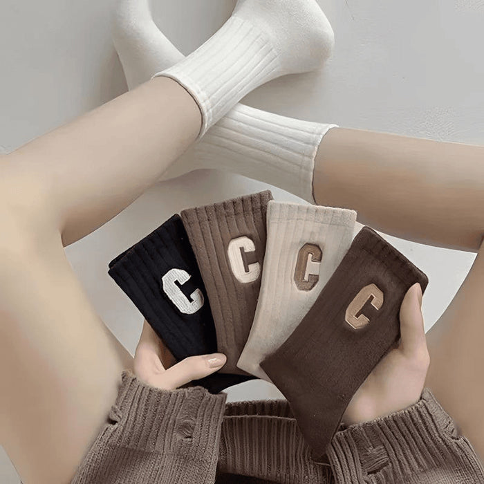 Wholesale Letter socks versatile mid tube socks soft and breathable for sports
