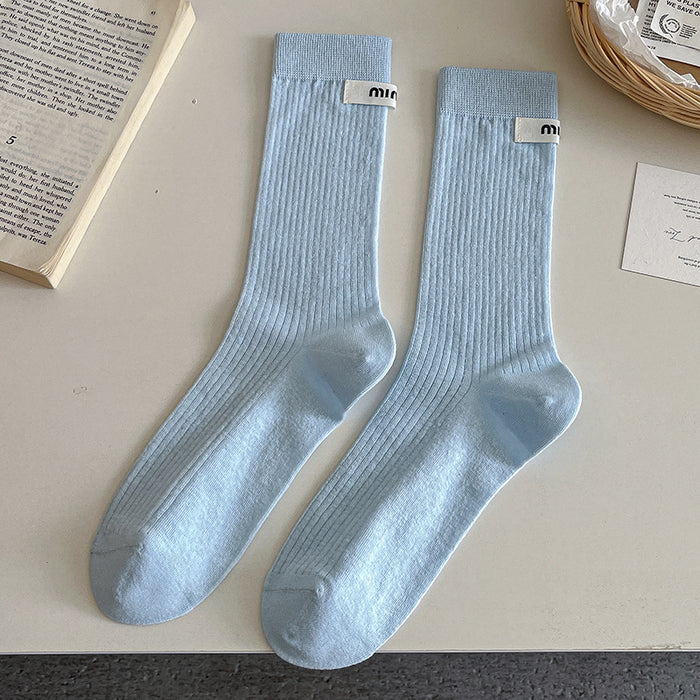 Wholesale Sock fabric label letter pile socks college style versatile colorful mid tube socks