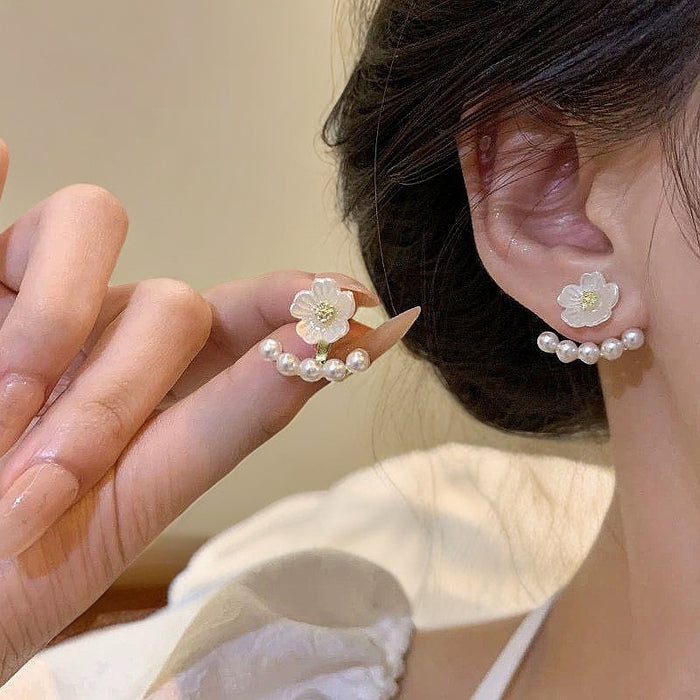 Wholesale Imitation pearl camellia earrings, a two on pearl earring with a light luxury and fashionable temperament