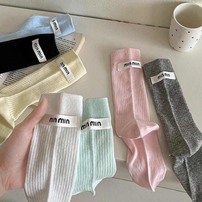 Wholesale Sock fabric label letter pile socks college style versatile colorful mid tube socks