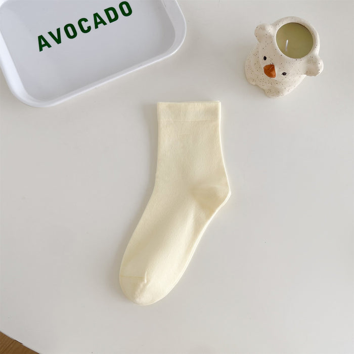 Wholesale Middle school women's solid color simple pile socks made of pure cotton