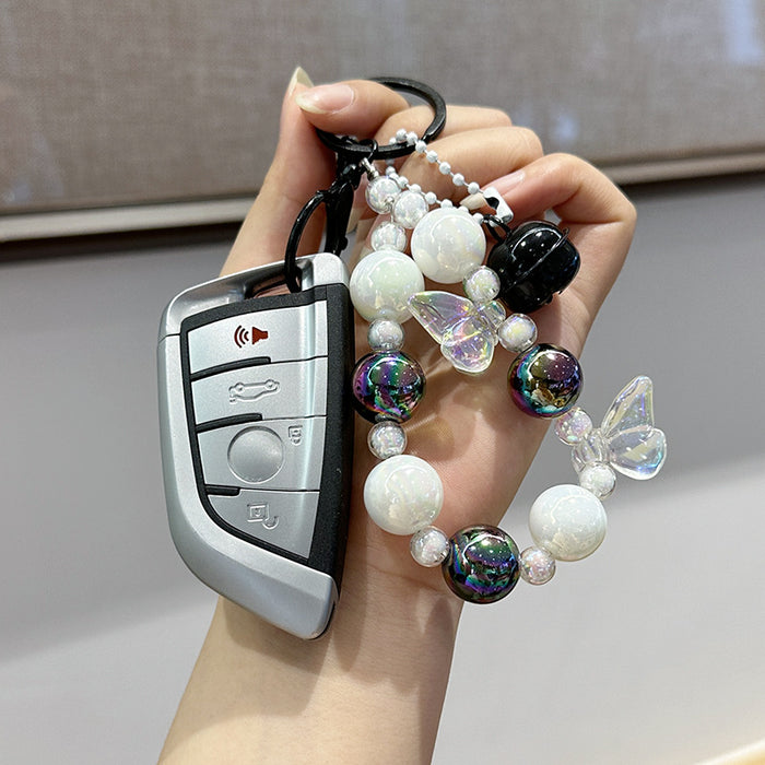 Wholesale Creative keychain, colorful bead phone chain, headphone bag, small pendant