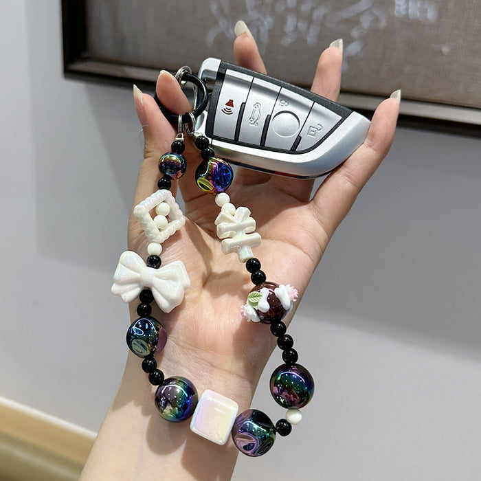 Wholesale Creative bow bead acrylic keychain bracelet pendant chain