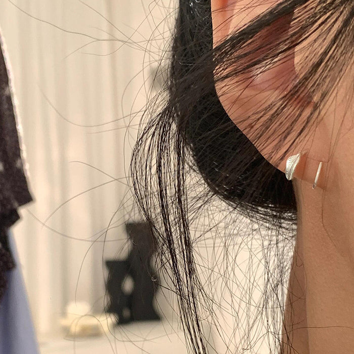 Wholesale Compact and minimalist leaf earrings with delicate and niche design, featuring metal leaf earrings