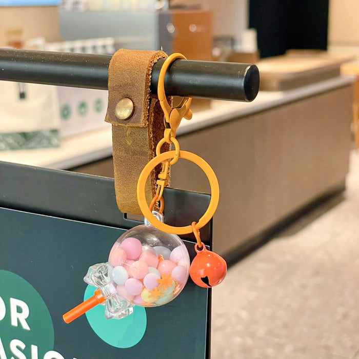 Wholesale Creative oil colored bead lollipop keychain cute cartoon car couple bag pendant small gift