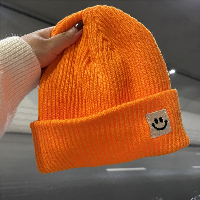 Wholesale Autumn and Winter Cute Smiley Face Logo Wool Knitted Hat JDC-FH-Yizhan002