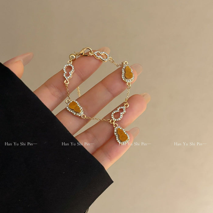 Wholesale Super Flash Pink Gourd Bracelet Women' s Gold Sense Exquisite White New Bracelet