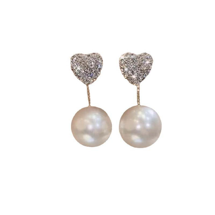 Wholesale A niche silver needle earring with two pearl studded diamond heart earrings