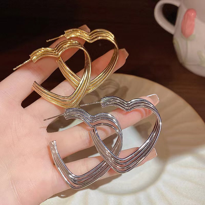 Wholesale Geometric heart-shaped exaggerated personality fashion woven earrings wholesale