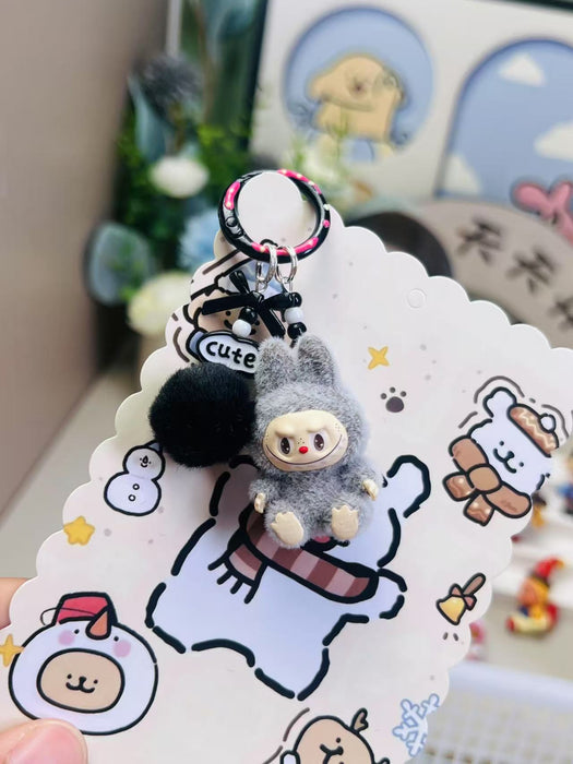 Wholesale Cute mini flocked sitting posture toy