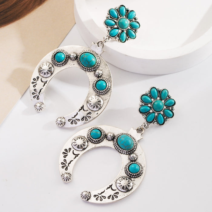 Wholesale Turquoise milk-textured leather earrings with diamonds and openwork design