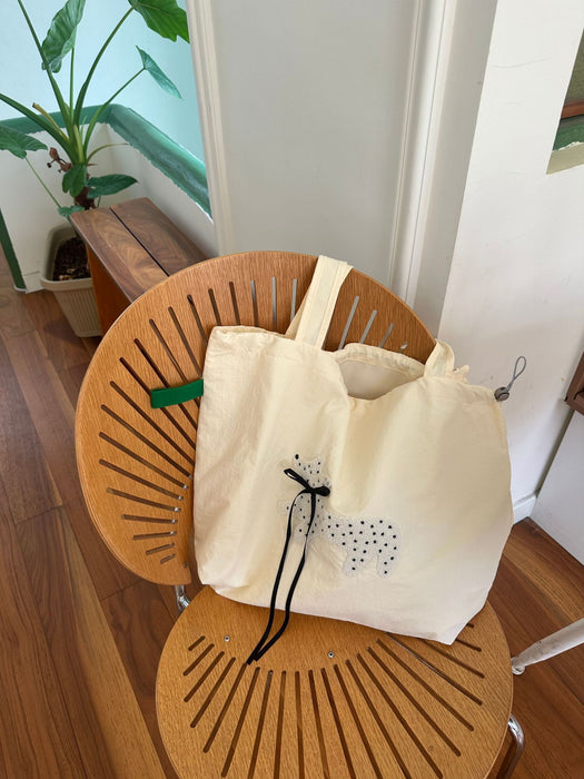 Wholesale Printed drawstring shoulder bag, large capacity handheld canvas, simple and fashionable