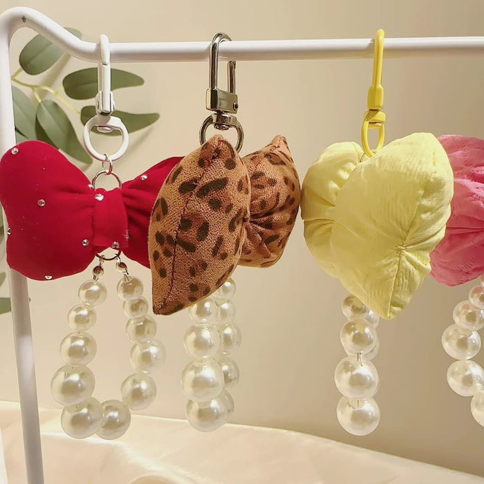 Wholesale Pearl Puff Bow Girl Keychain Cute All-match Mobile Phone Chain Bag Pendant
