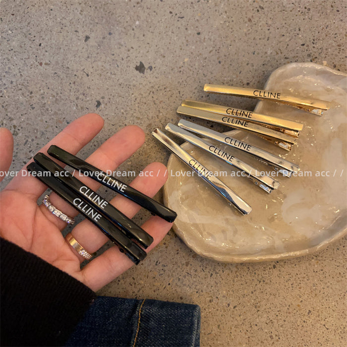 Wholesale Metallic style letter shaped hair clip with fashionable side bangs and ponytail accessories